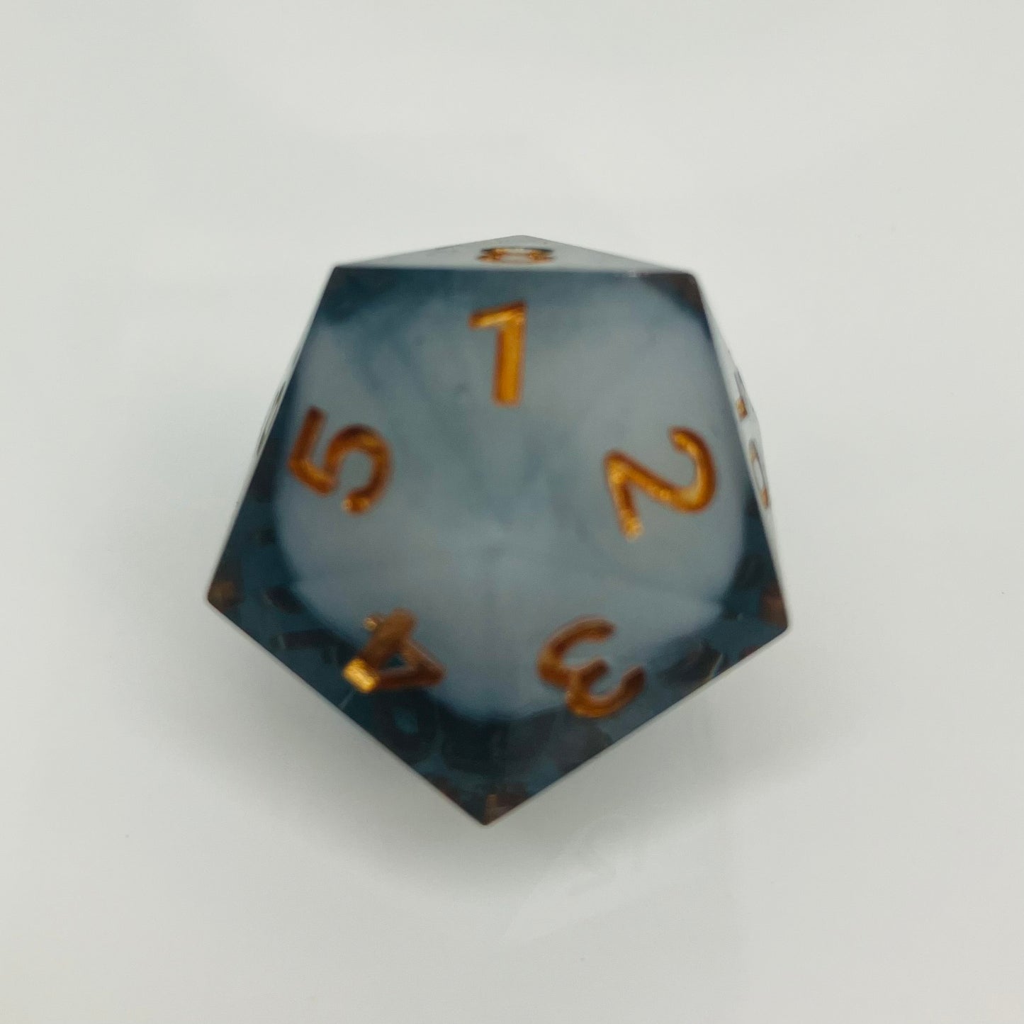 White cloud in dark grey spindown d20 with gold numbers