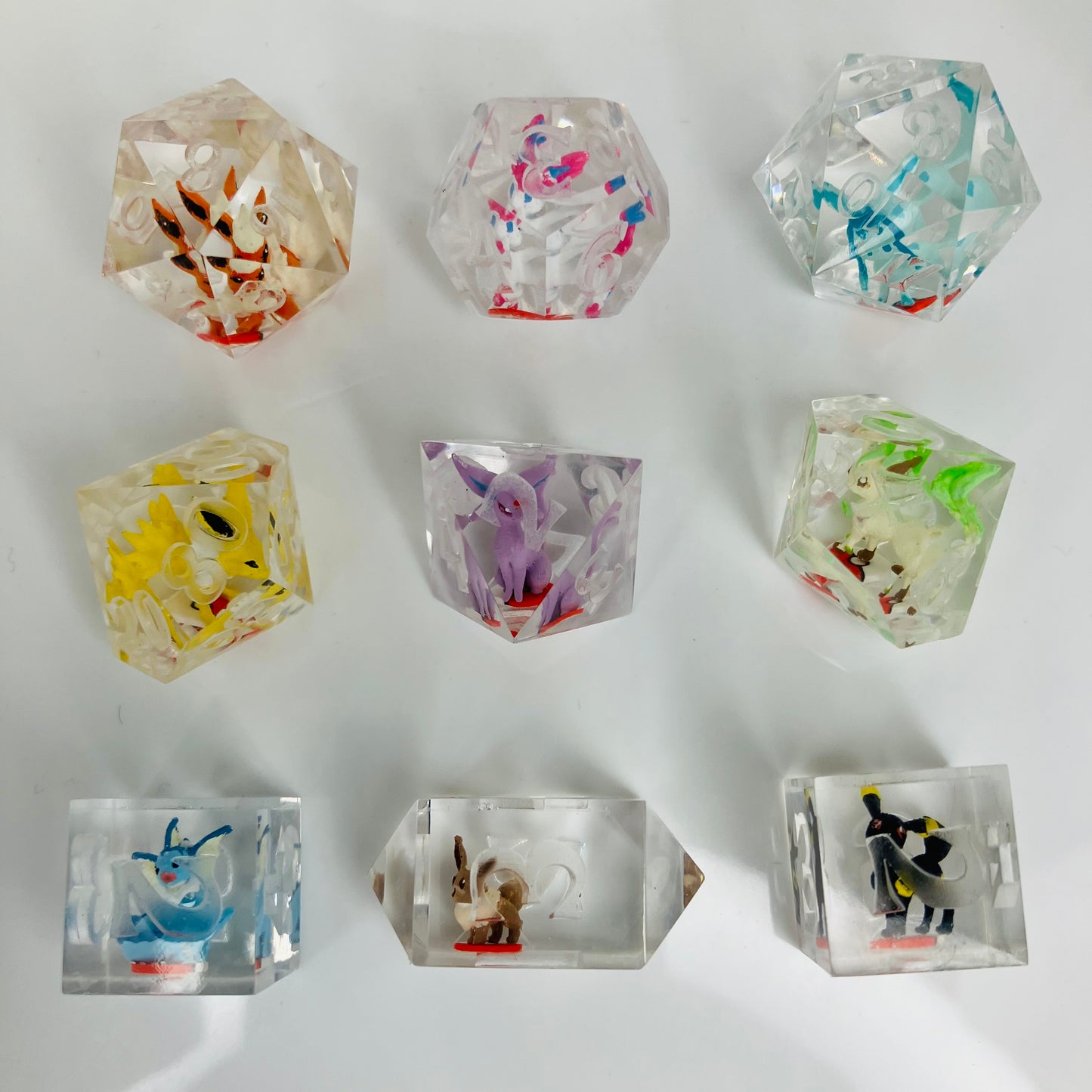 Eevee-lutions 9 piece polyhedral dice set