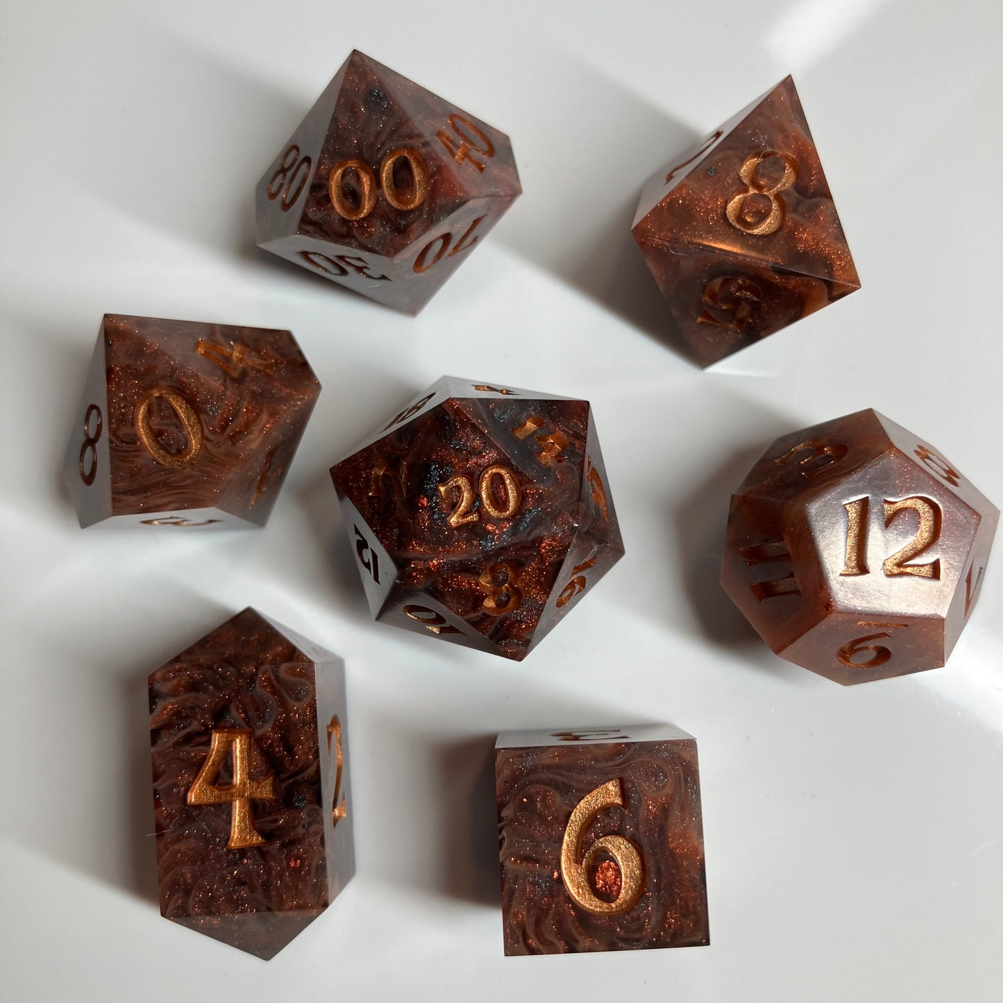 Gold flecks sparkle throughout these dice