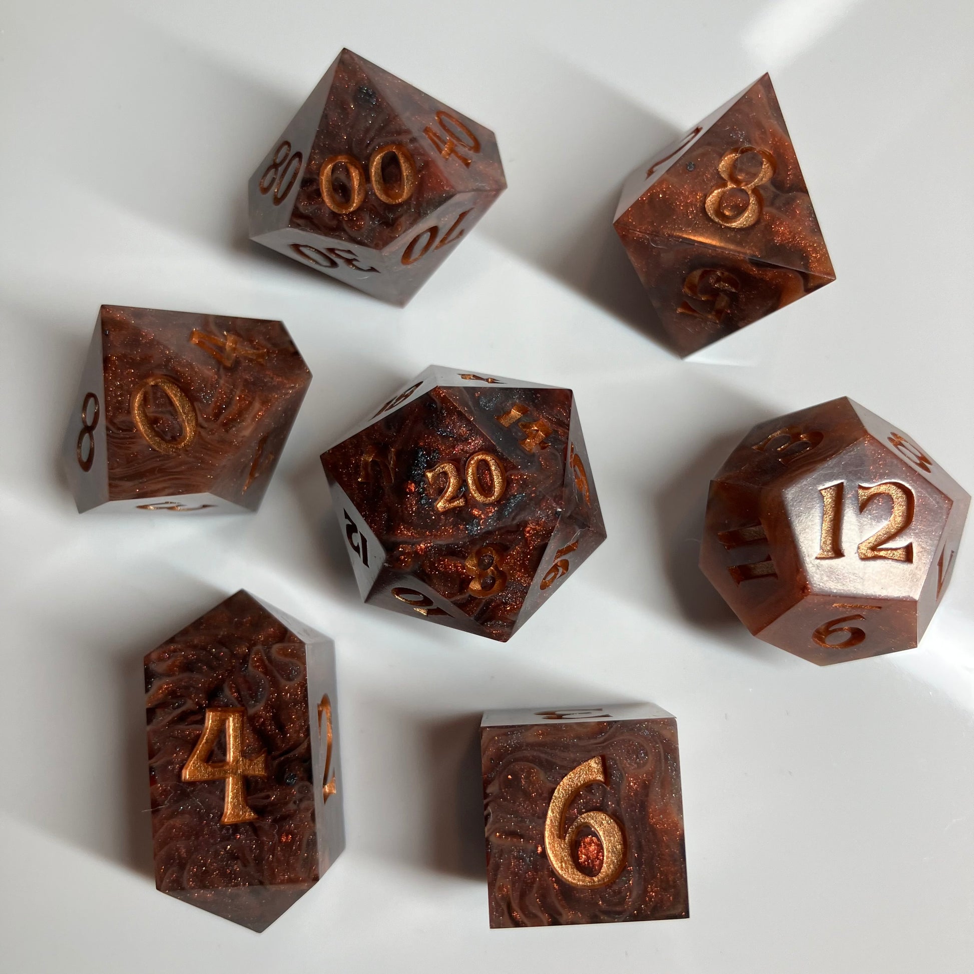 Gold flecks sparkle throughout these dice