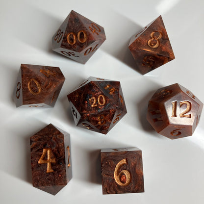 Gold flecks sparkle throughout these dice