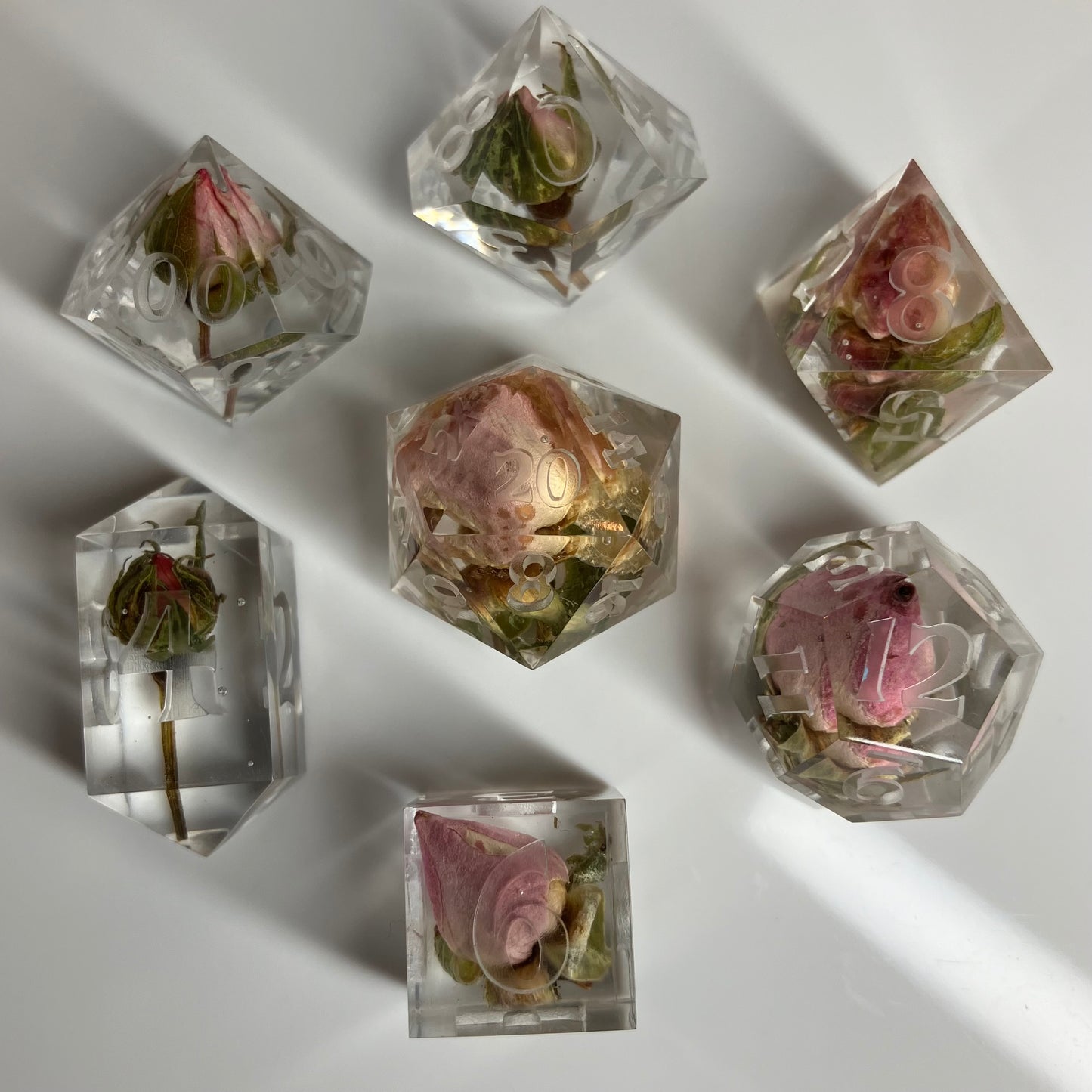 real roses set in clear dice for dnd pathfinder and other ttrpgs