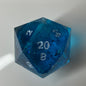 30mm d20 Chonk Liquid Core  blue d20 with floating glitter inside.