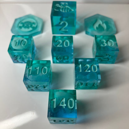 Set of teal dice with clouds for the Pokemon TCG