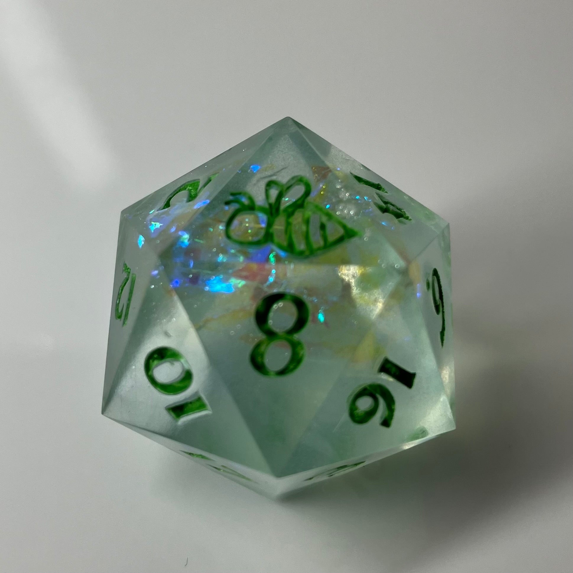 24mm d20 with bee logo on 20 and blue flashes in the light