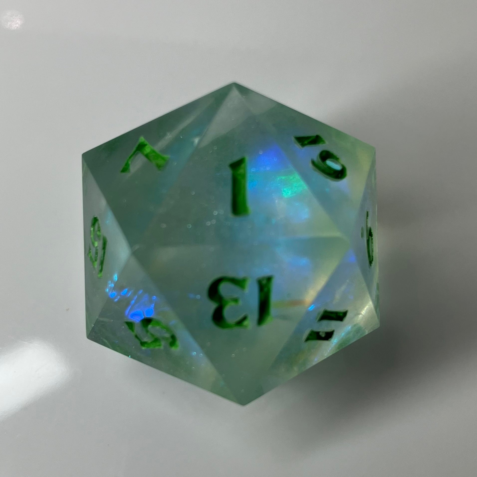 24mm Large d20 Glow in the Dark with blue flashes in the light
