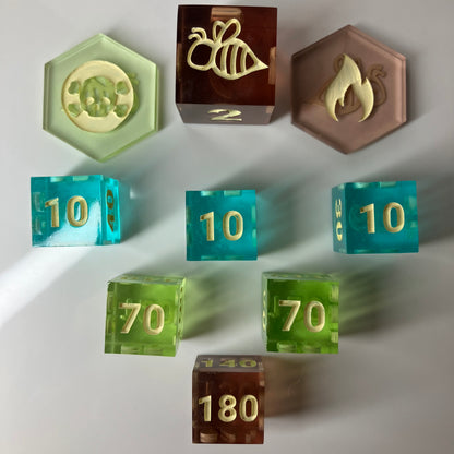 Set of colorful dice with various symbols and numbers for Pokemon TCG