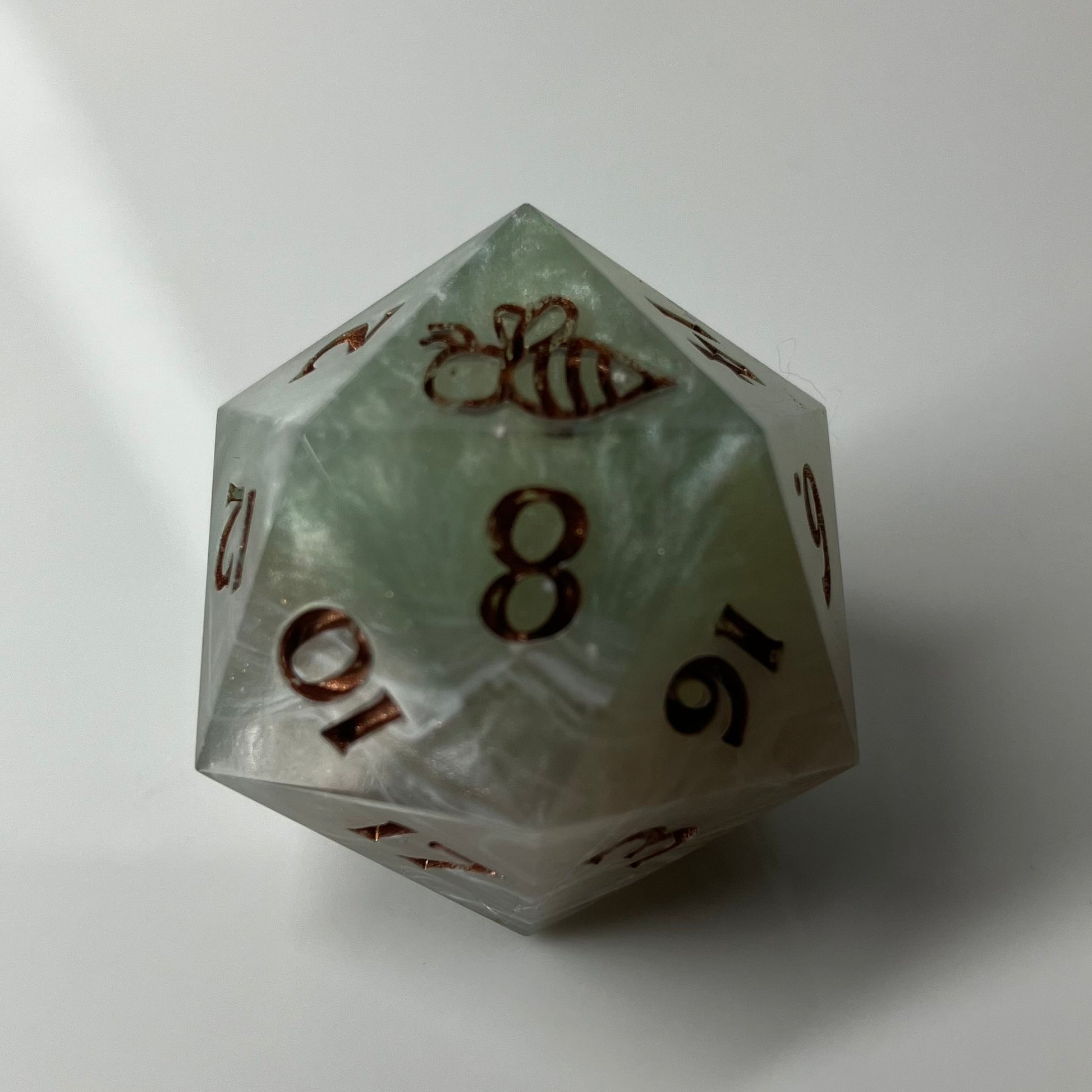 24mm Large d20 with Bee Logo. sage green with silver accents that seem to move
