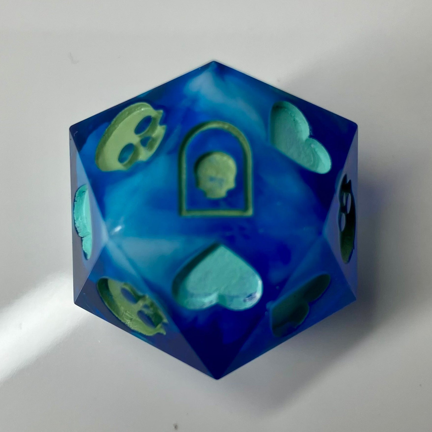 Deep blue d20 with white in middle like deep sea for dnd