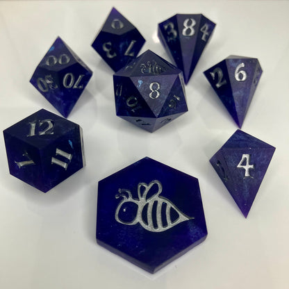 royal purple dice with numbers painted silver in gemstone shapes