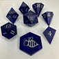 royal purple dice with numbers painted silver in gemstone shapes