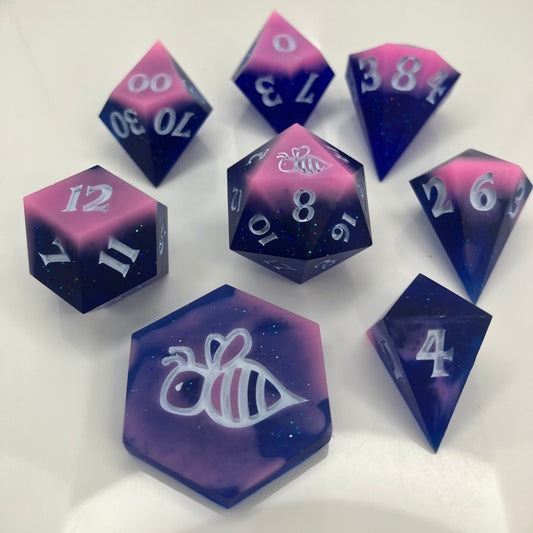 resin dice with glitter and in unique shapes
