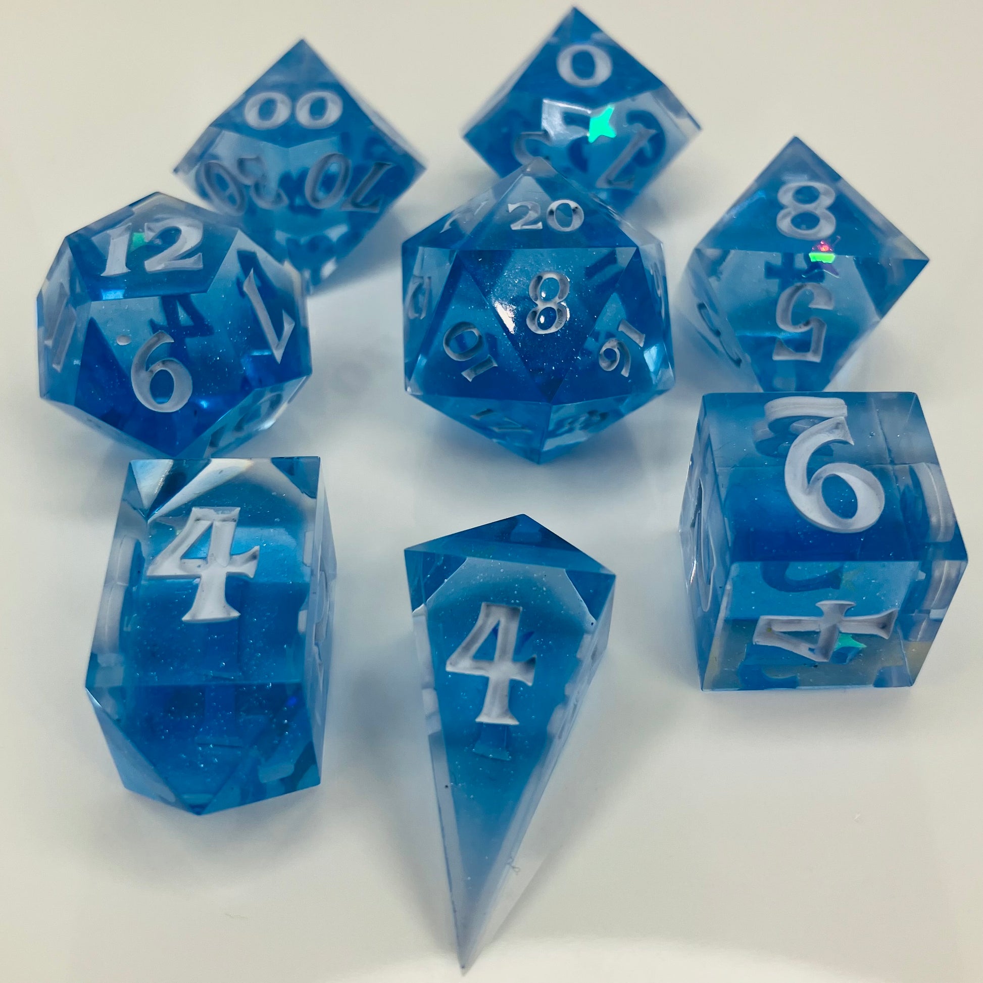 crystal blue resin dice with holographic star glitter