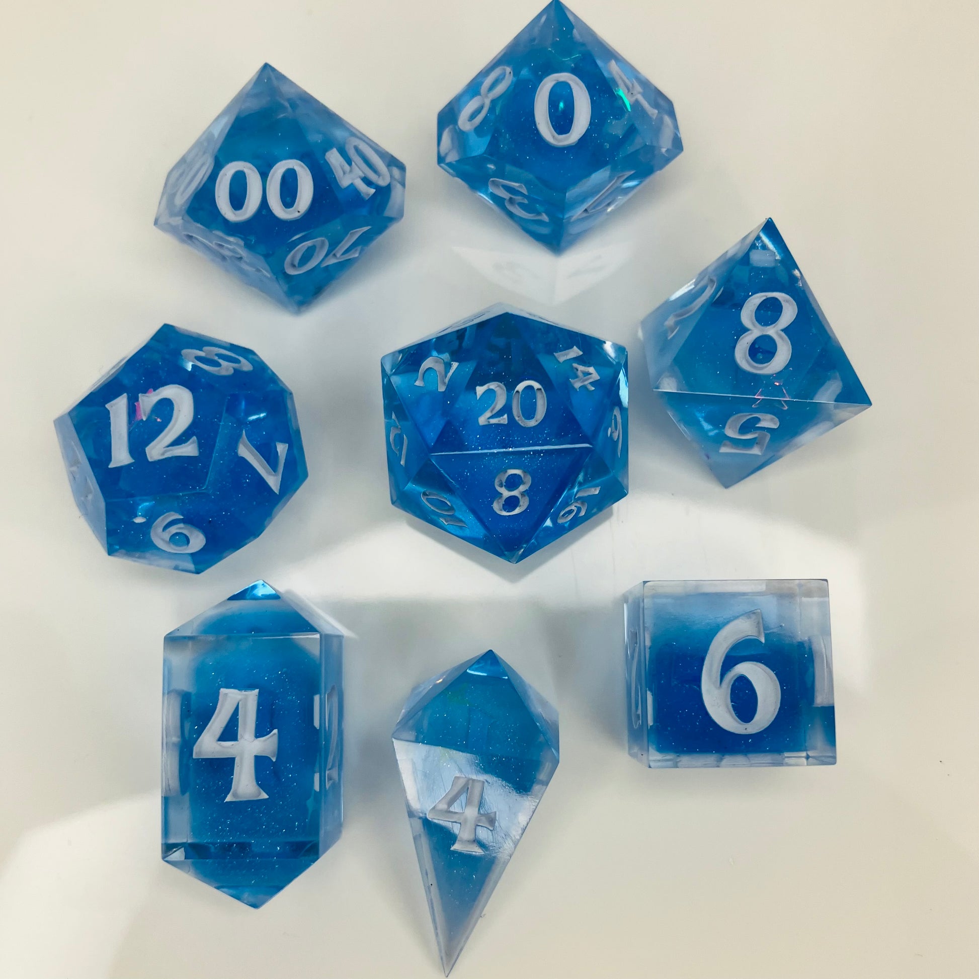 crystal blue resin dice with holographic star glitter