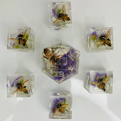 Transparent dice with embedded bees and flowers for Lorcana