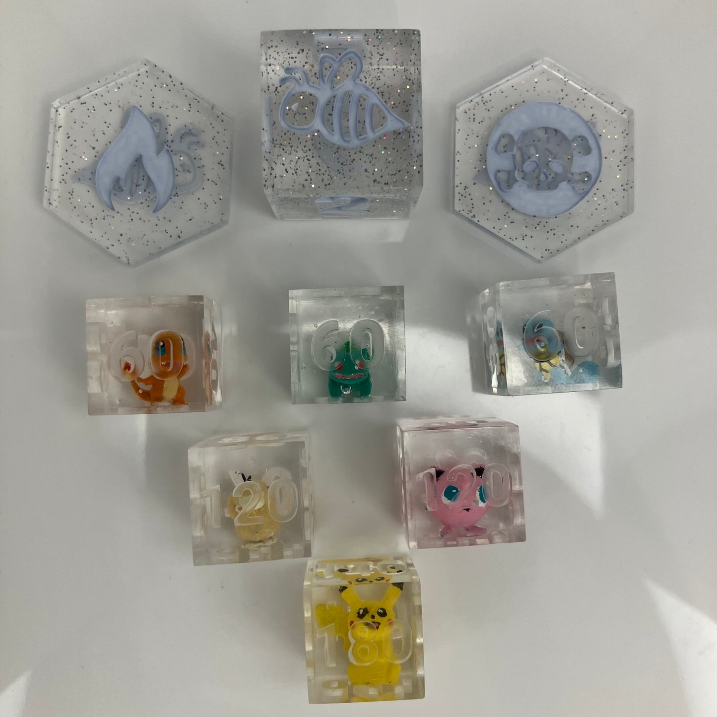 Hand painted pokemon set in clear dice