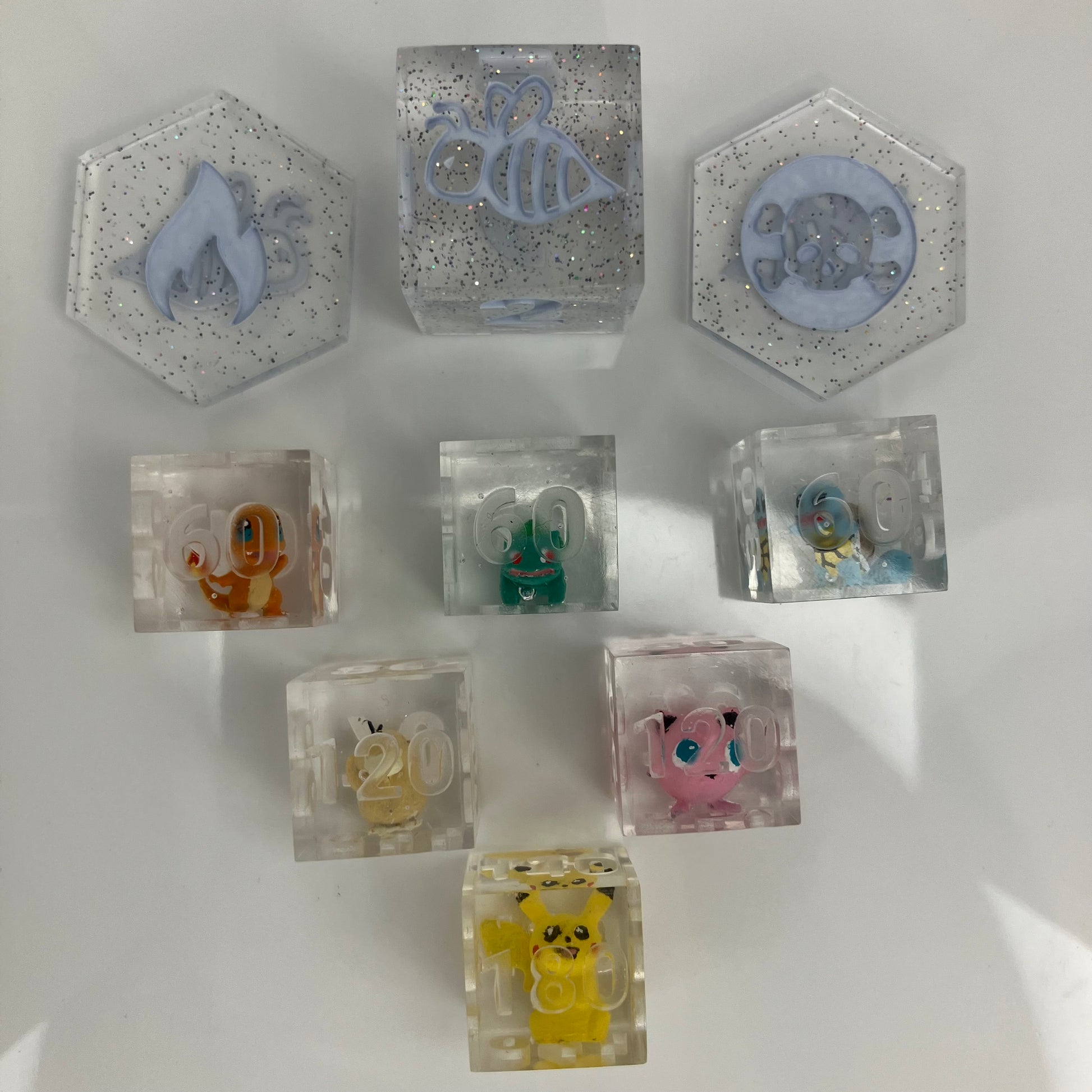 Hand painted pokemon set in clear dice