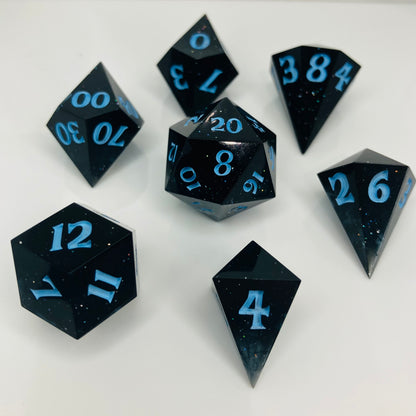 Clear to black galaxy gemstones set of gaming dice with sparkles.