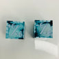Two d6 dice with positive and negative counters