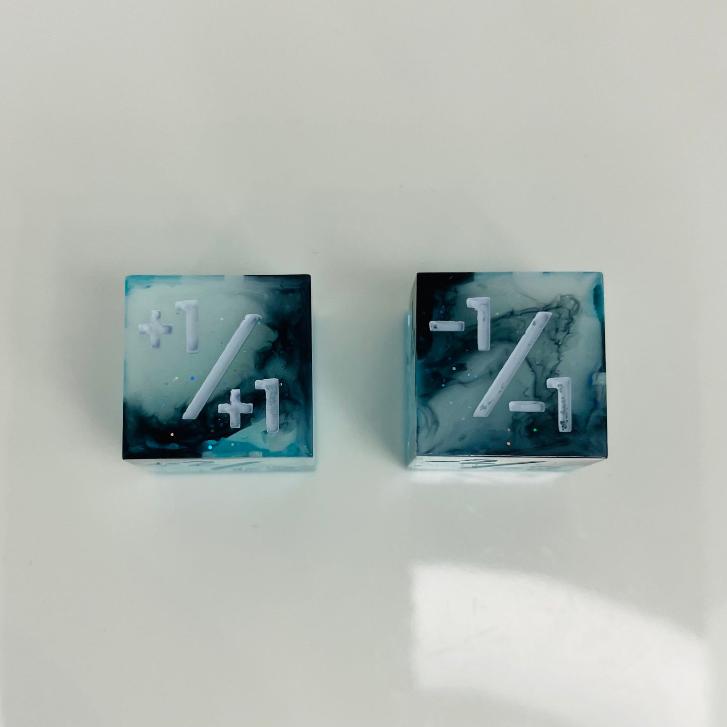 Two dice with positive and negative counters for magic the gathering