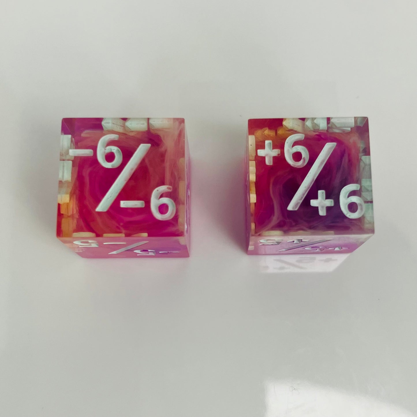 pink swirls in clear dice for magic the gathering