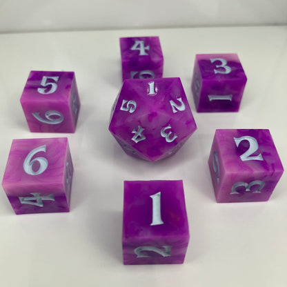 pink spindown d20 and d6 for use with lorcana