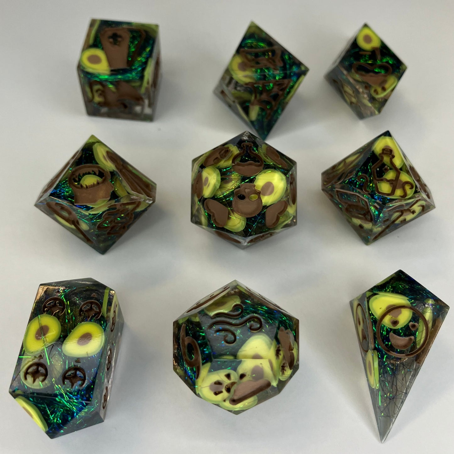 GM set featuring clear resin with avocados and green and gold metallic threads